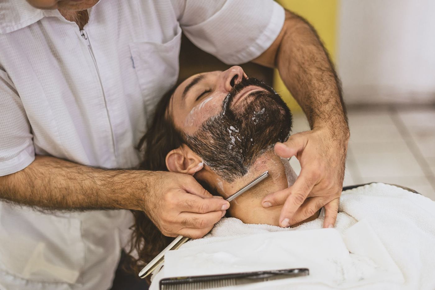 Beard trim with a straight razor.