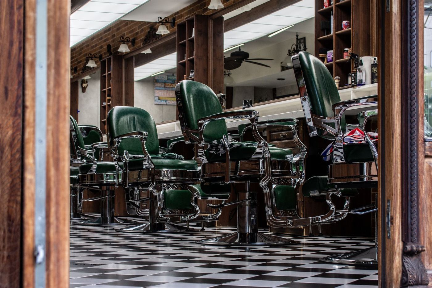 Barber chair and mirror at the shop.