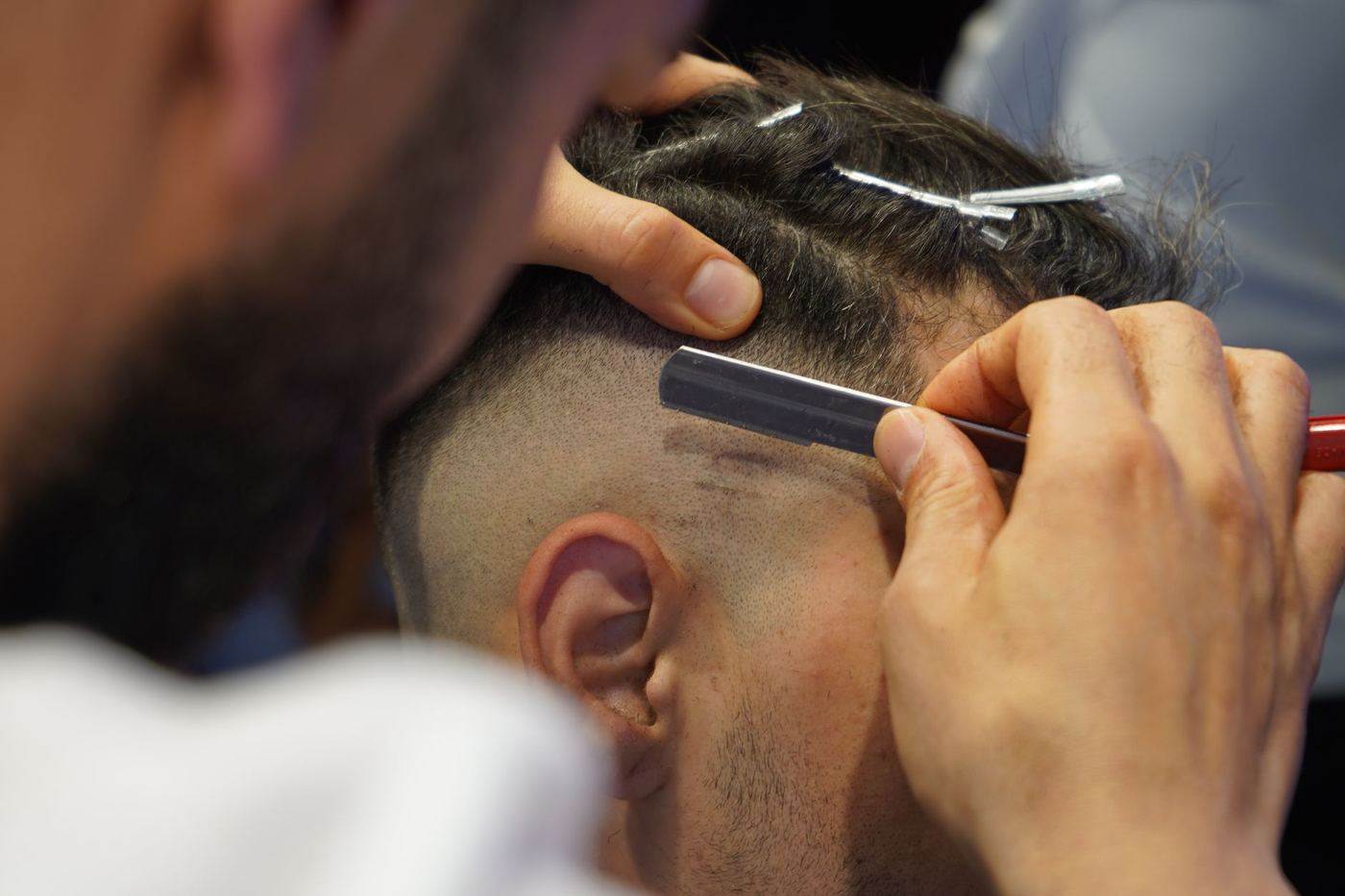 Fresh skin fade, mid-cut.